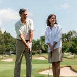 Couple golfing in Sea Trail Plantation n Sunset Beach, NC