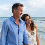 Couple on a beach walk on Ocean Isle Beach, NC